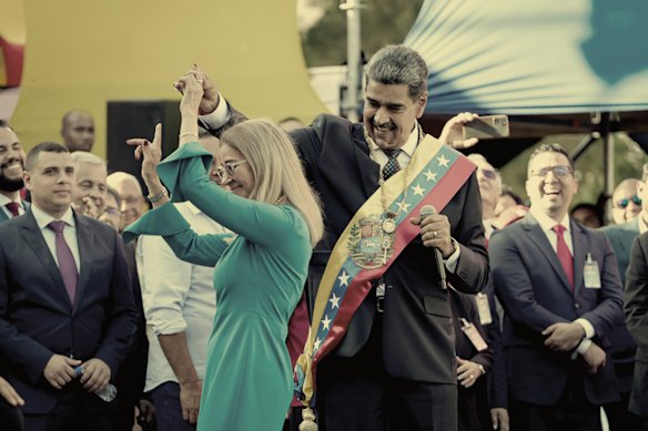 Maduro and his wife, lawyer Cilia Flores, celebrate before his swearing-in for a third term as president in January. 