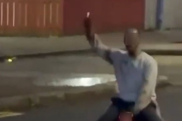 A blurred image from a video of the alleged stabbing.