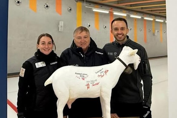 Tahli Gill and Dean Hewitt with the spoils of victory in Gstaad, Switzerland, in October.