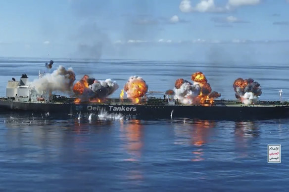 This frame from video released by the Ansar Allah Media Office, the media arm of Yemen’s Houthi rebels, in August 2024, shows explosions striking the Greek-flagged oil tanker Sounion in the Red Sea after Houthi rebels boarded and set explosives on the tanker.