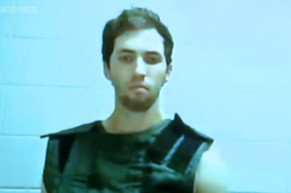 Shooting suspect Tyler Robinson appears on a courtroom video link on Tuesday.