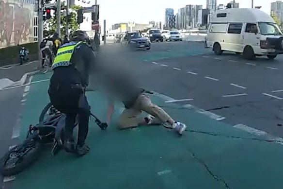 Officers allege the 19-year-old was seen riding an illegal bike down Elizabeth Street in Brisbane.