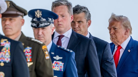 Daniel Driscoll (centre) found himself increasingly at-odds with Defence Secretary Pete Hegseth (centre right) and Donald Trump.