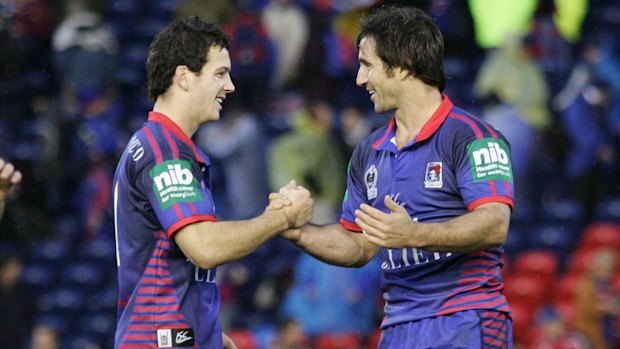 An 18-year-old Jarrod Mullen and his halves partner, Andrew Johns.