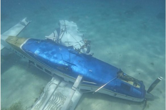 The Cessna at the bottom of the sea floor off Rottnest Island. The right wing can be seen “hinged backwards” and into the cabin at the top of the picture.