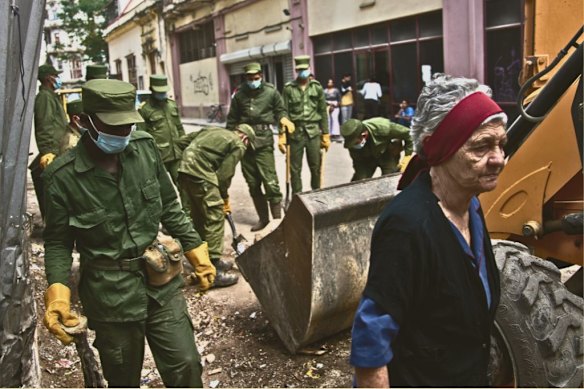 Soldiers collect garbage in Old Havana in late February.