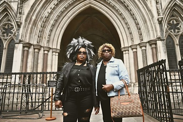 Bernadette Dugasse and Bertrice Pompe, born on Diego Garcia and who live in Britain, in May 2025 outside London’s High Court, where they brought legal action against the government over a Chagos Island deal.  
