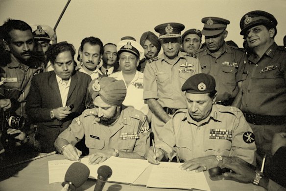 The chief of staff of the Indian Army, General Jagjit Singh Aurora, and General Amir Abdullah Khan Niazi, of the Pakistani Army, sign the papers on December 16, 1971 that would end the war between the two countries and lead to the creation of Bangladesh.  