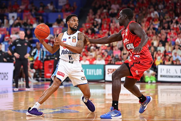 Bryce Cotton controls the ball during the NBL match between the Perth Wildcats and Adelaide 36ers at RAC Arena.