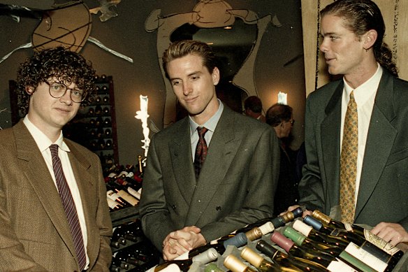 Newsom, centre, flanked by Peter Getty, left, and Billy Getty at the opening party for PlumpJack’s wine shop in 1992. 