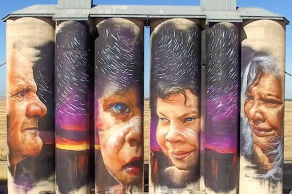 Ronald Marks (far left) is featured on a silo art mural in Sheep Hills.