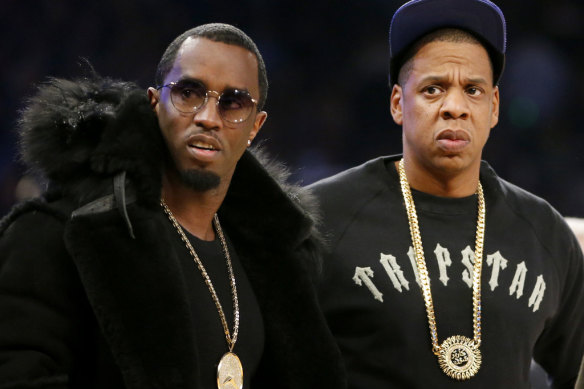 Sean “Diddy” Combs and Jay-Z at a basketball game in 2015.