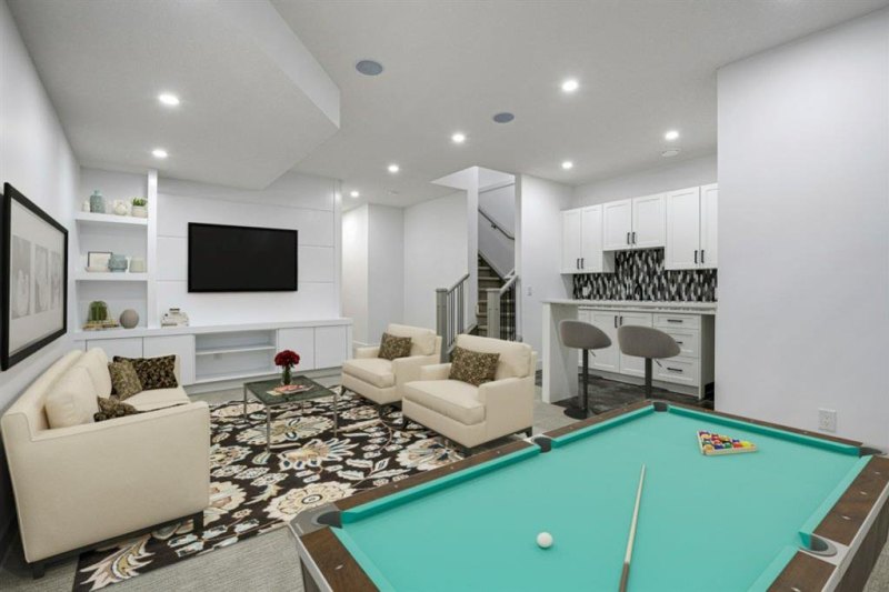 The four-bedroom home’s interior is light and modern.