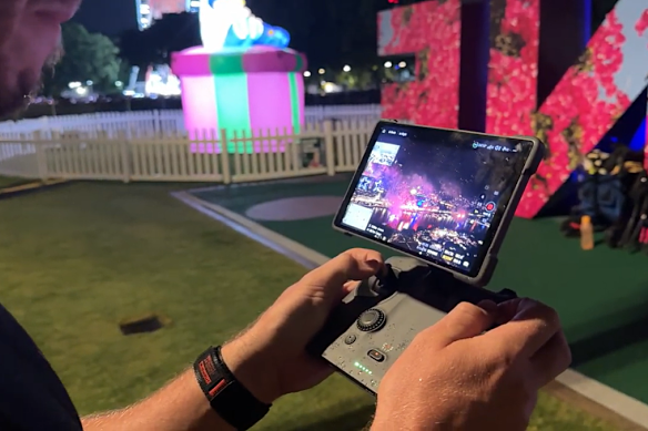 Michael Rubio said he needed goggles to pilot the more immersive FPV drones, unlike the handheld controls used for a more traditional gimbal drone (pictured).