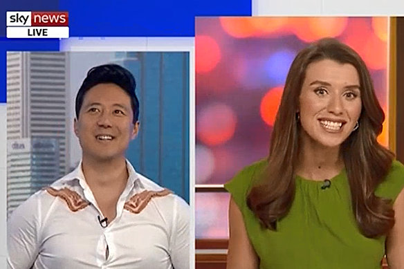 Sky News host Freya Leach with guest Ryan Williams (left) wearing raw rashers of bacon on Sunday night.