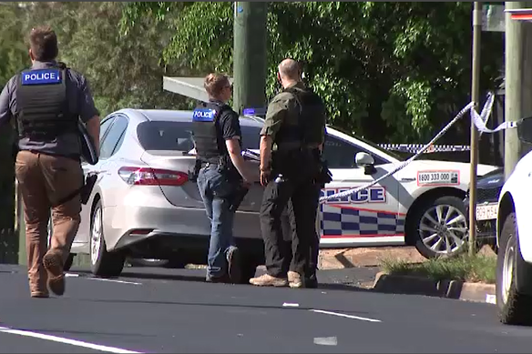 Police at the scene in North Toowoomba after a woman was shot and later died.