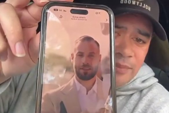 TikTok user Triggz, real name Peter Vaiusu, holds up a picture of alleged kidnapping victim George Ayoub.