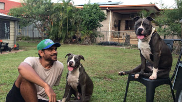 Cyril Rioli with his much-loved dogs, Koda and Kenai.