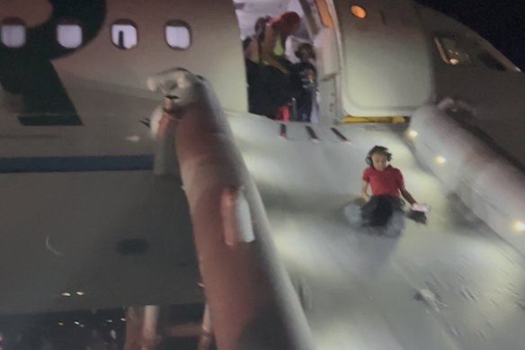 The aircraft’s emergency slides were deployed to evacuate the passengers.