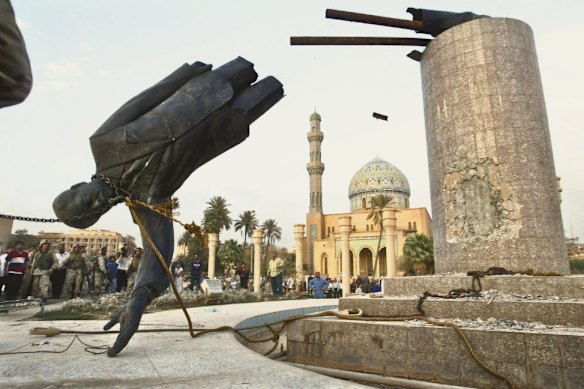 Us troops in central Baghdad topple a statue of Iraq’s leader Saddam Hussein in April 2003.