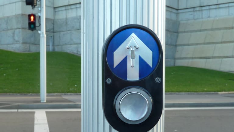 Pedestrian traffic light buttons are deactivated in the city most of the time.