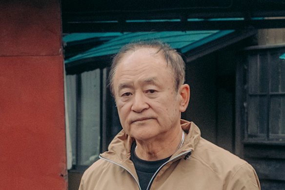 Keiji Minatoya outside the confectionery workshop where he was attacked by a bear two years ago, in Kita-Akita.