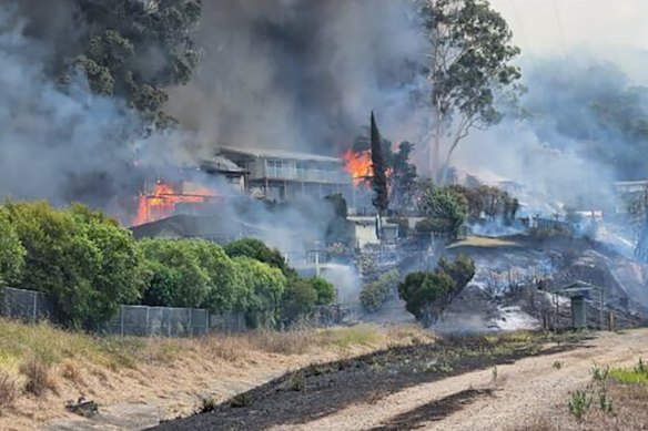 A bushfire destroys houses in Koolewong in December.