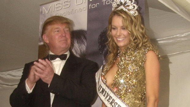 Former Miss Universe owner Donald Trump with pageant winner Jennifer Hawkins in 2004.