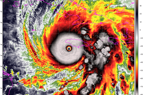 Satellite image shows the monster hurricane, which dwarfs Jamaica, the purple outline.