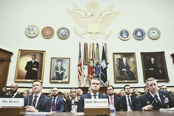 Pete Hegseth flanked by Jay Hurst, left, and Dan Caine testify before a congressional committee about defence budgets on April 29.