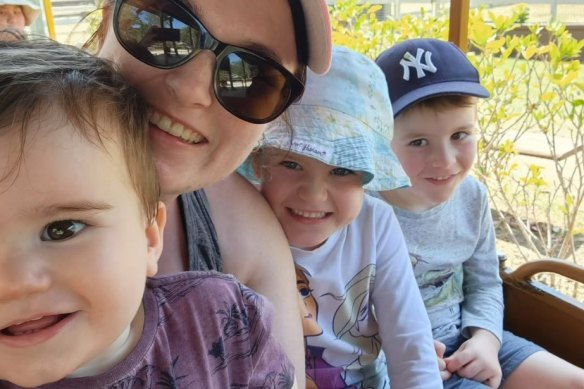 Brisbane mother Amelia and her young family. Two of her children were hospitalised with influenza, while she herself was also battling an infection.