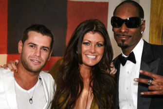 Eugeni ‘Zhenya’ Tsvetnenko and Lydia Tsvetnenko, who is not accused of any crime, party with rapper Snoop Dogg.