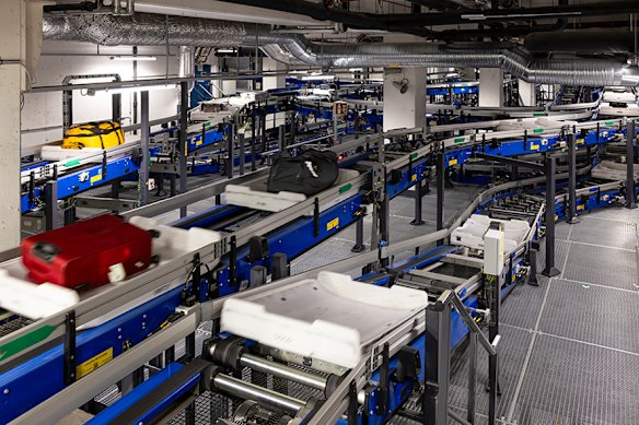 A system of totes carries the bags.