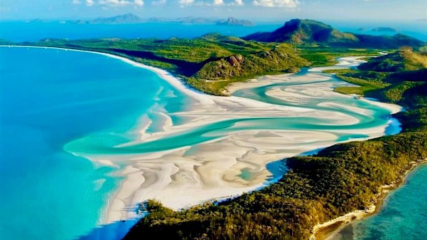 The swirling white silica sand and turquoise waters of Whitehaven Beach.