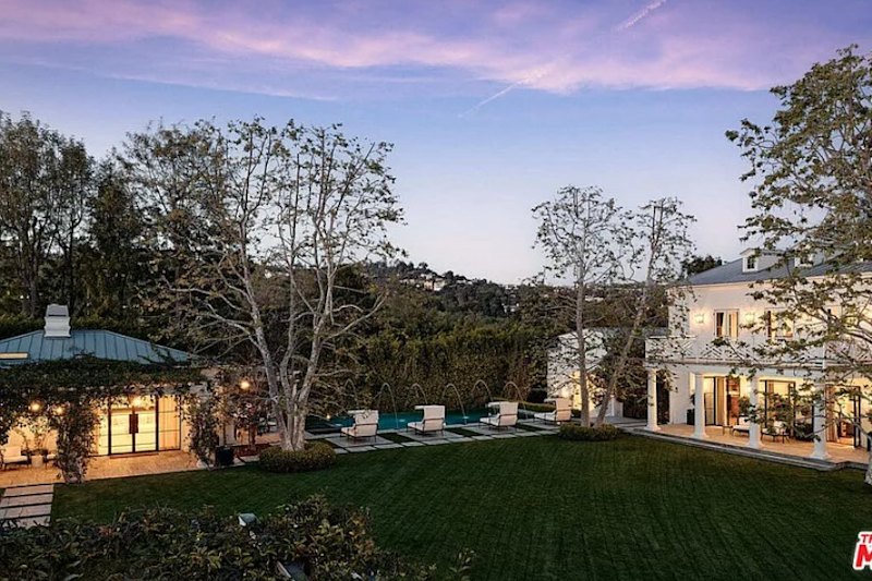 The home comes with landscaped grounds.