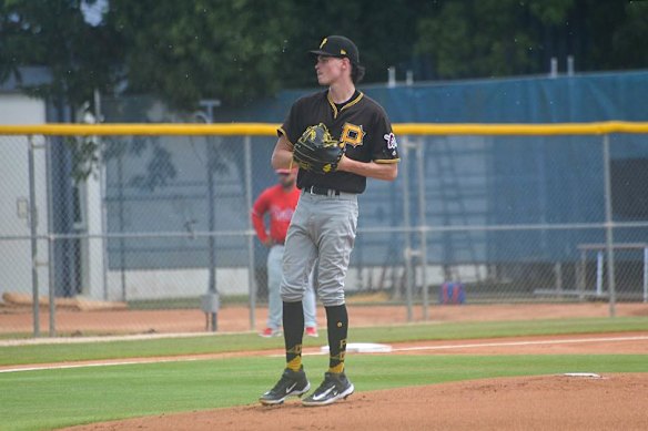  Robinson pitches in his first game in the Dominican Republic.