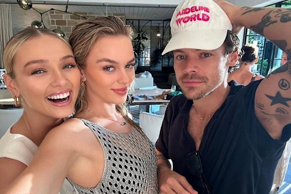 Justin Hemmes’ partner, Madeline Holtznagel (centre) with pop star Harry Styles.