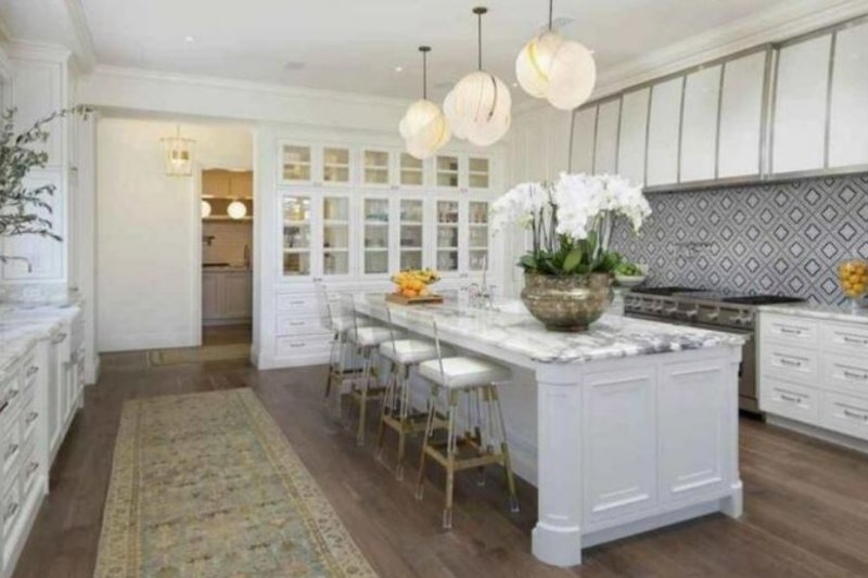 Just one of the home’s four kitchens.