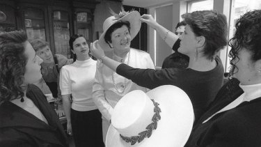 In 1991, Joan Kirner tries on one of two hats made for her by clothing studies students at Broadmeadows College of TAFE to wear to the Cup and Oaks Day.