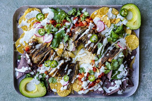 Freshen up your usual nachos with this yoghurt dressing and fresh toppings.