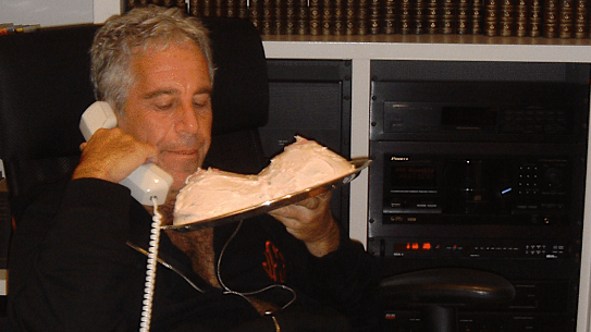 Jeffrey Epstein contemplates a cake in the shape of women’s breasts.