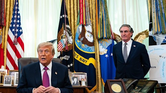 US President Donald Trump and Doug Burgum, US secretary of the interior, speak to members of the media in the Oval Office of the White House. 