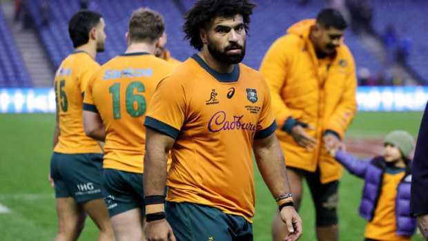 Zane Nonggorr of Australia looks dejected after defeat to Scotland.