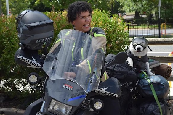 Crispin and Moon on their motorbike.