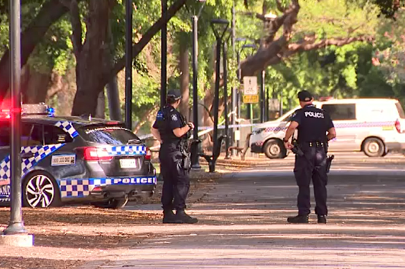 Police cordon off Brisbane’s City Botanic Gardens to stop the public approaching.