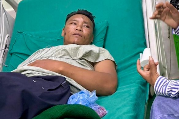 Sidar Tamang in his hospital bed on Friday. 