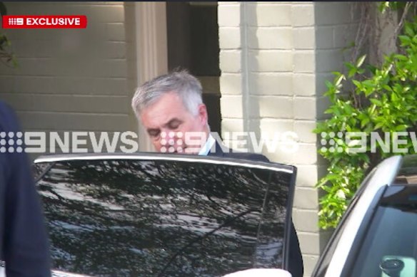 Optus chief executive Stephen Rue leaves his house on Tuesday morning. Picture Nine News