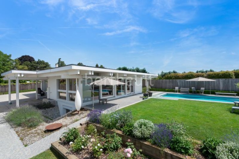 This house in Geneva has great views and an outdoor pool.
