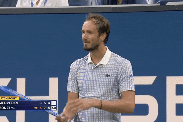 Daniil Medvedev blows kisses as the crowd gets loud in his US Open match.