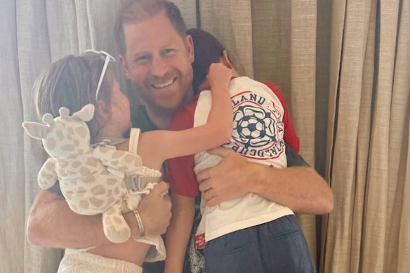 Meghan, Duchess of Sussex, posted an image on Instagram of Prince Harry being hugged by their two children, Lilibet and Archie.
